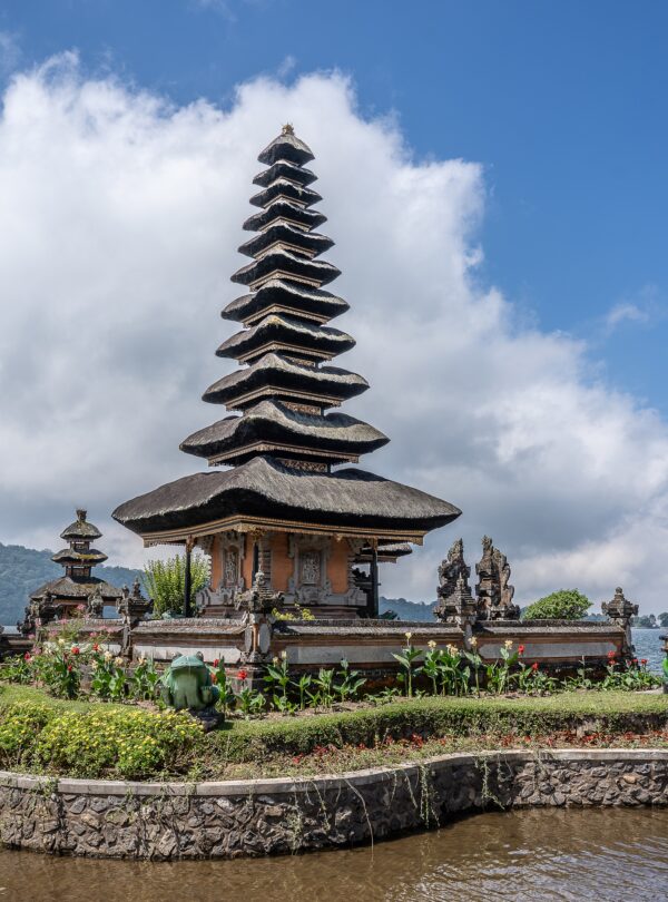 Pura Ulun Danu Bratan temple in Indonesia with the white clouds in the background